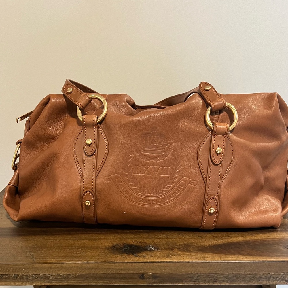 Selling this beautiful brown Ralph Lauren bag gently use couple times .